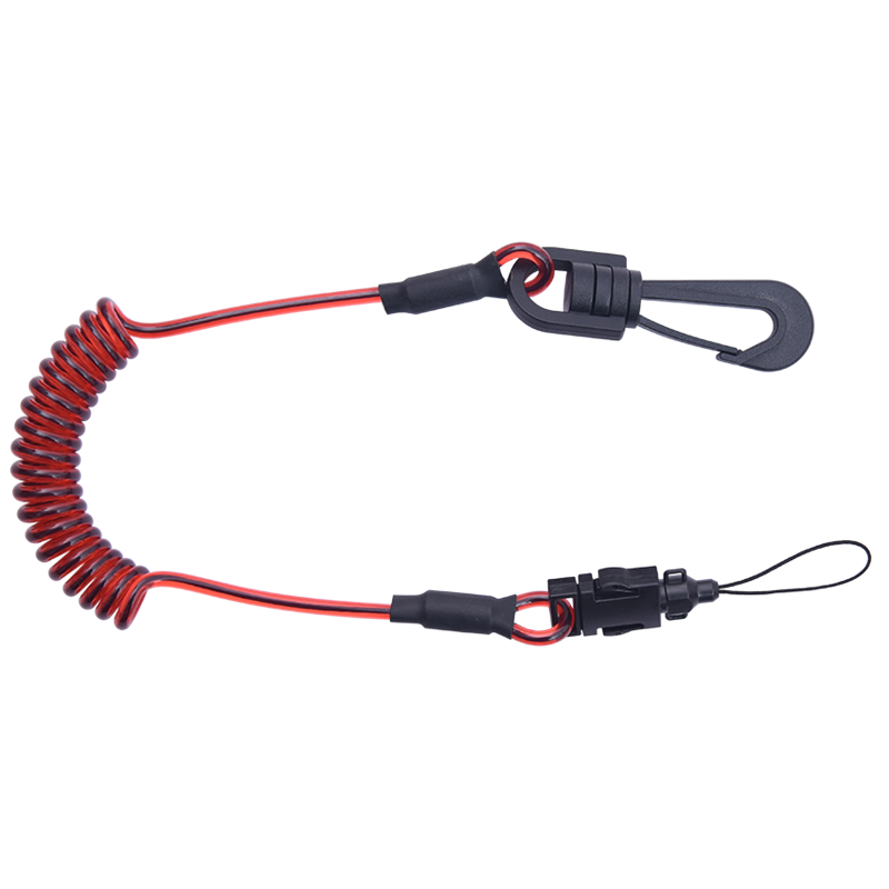 Coil tool lanyard with a swivel connector and a detachable attachment loop